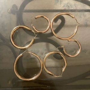 Multiple set of hoops. Hailey Bieber vibes